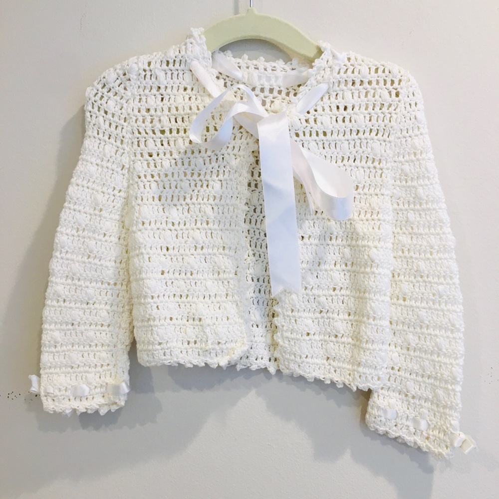 Knitted white bolero